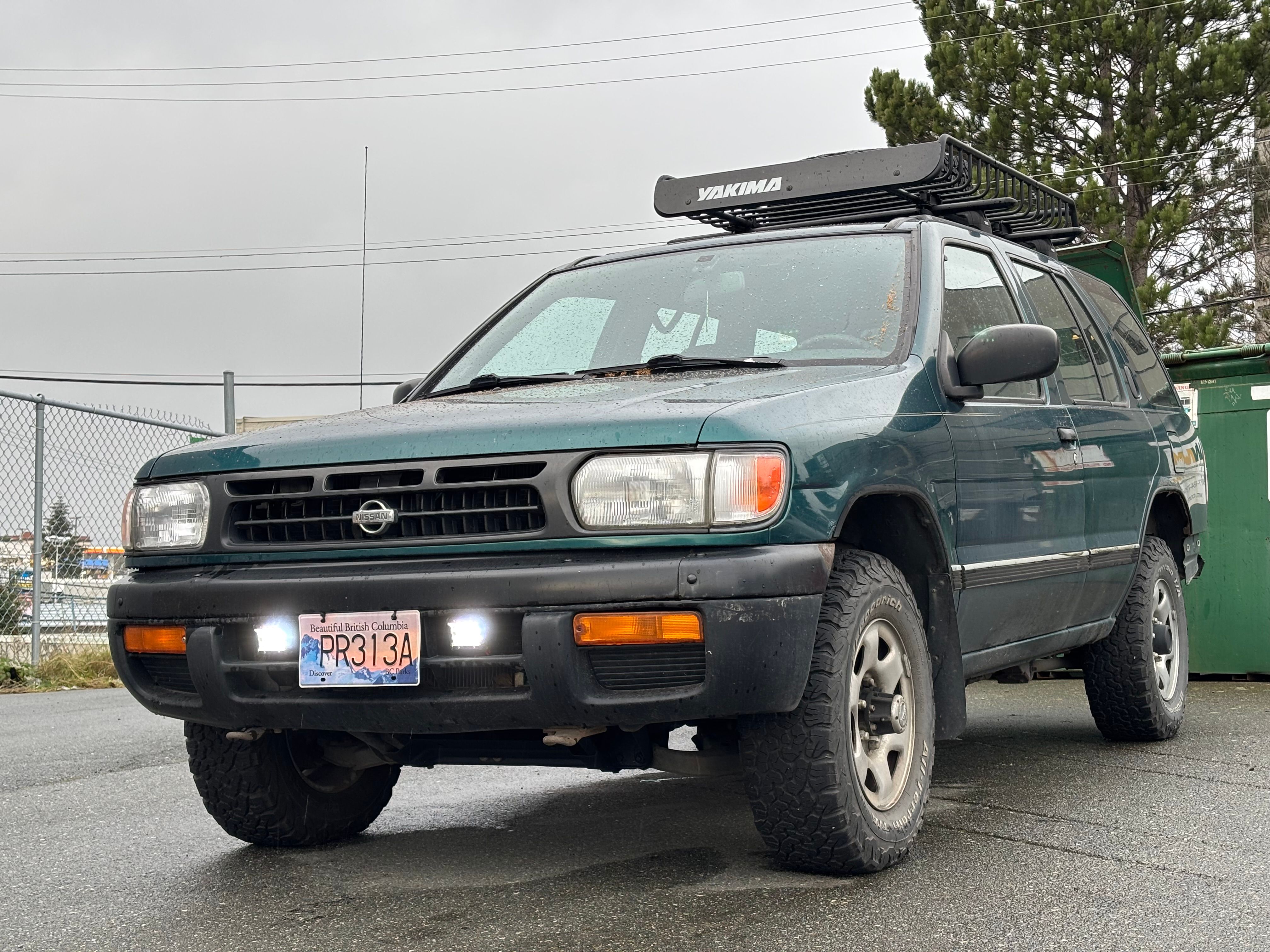 1997 Nissan Pathfinder with two LED light pods installed in the front bumper